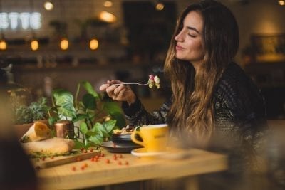The Circadian Rhythm And Constipation Connection: Things You Need To Know | circadian rhythm pablo merchan montes 772142 unsplash 2 woman eating hours before bedtime circadian rhythm