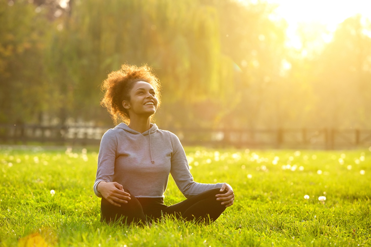 What Gut Type Are You? Discover the Truth! | gut type shutterstock 285334562 woman sitting on the grass gut type