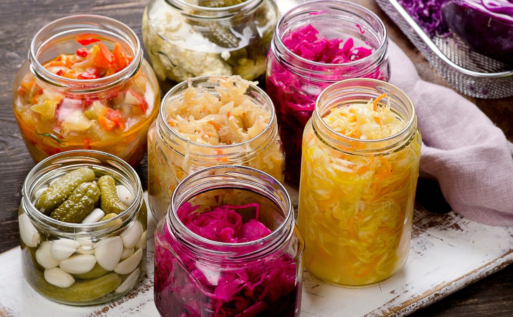 5 Steps to Heal Post Birth Control Syndrome for a Total Hormone Reset | Post Birth Control Syndrome Fermented vegetables in jars. Vegetarian food concept Post Birth Control Syndrome - Post Birth Control Syndrome - Fermented vegetables in jars