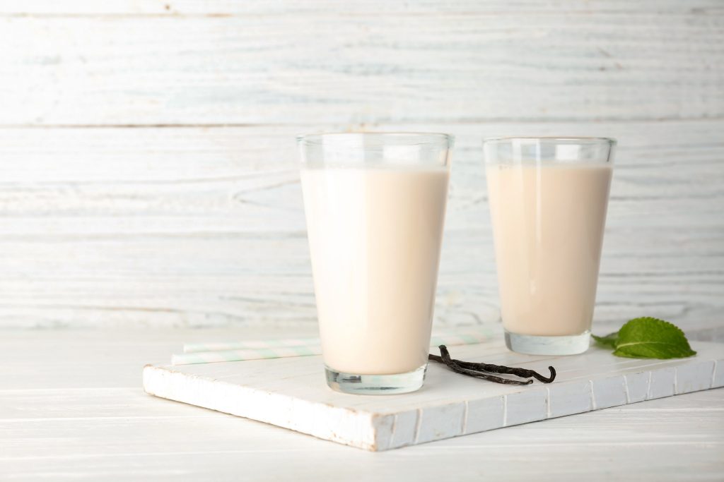 Small Changes, Big Impact: 3 Daily Habits to Heal Your Gut | heal your gut Glasses with vanilla milk shakes on table heal your gut - Glasses with vanilla milk shakes on table
