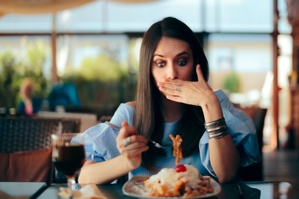 Small Changes, Big Impact: 3 Daily Habits to Heal Your Gut | heal your gut Woman Feeling Sick While Eating Huge Meal heal your gut - Woman Feeling Sick While Eating Huge Meal