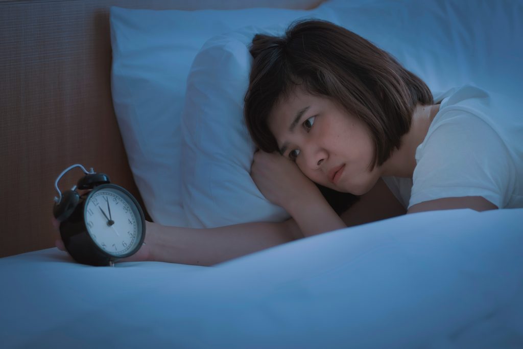 Small Changes, Big Impact: 3 Daily Habits to Heal Your Gut | heal your gut woman tries to sleep but she cannot sleep because she has anxiety and stress heal your gut - woman tries to sleep but she cannot sleep because she has anxiety and stress