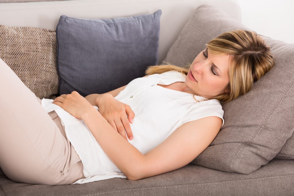Hormone Imbalance 101: 4 Little-Known Causes Your Doctor Didn’t Tell You About | hormone imbalance Close up Of Young Woman Having Stomach Pain hormone imbalance - Close-up Of Young Woman Having Stomach Pain