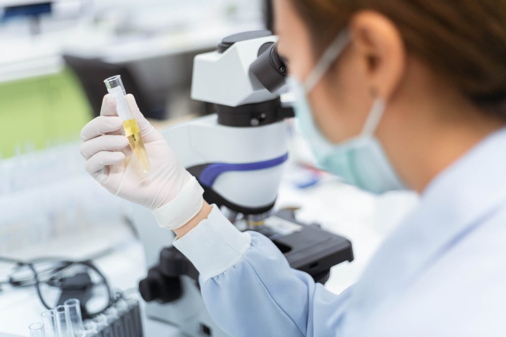What is Functional Medicine? 10 Benefits of Functional Medicine for Your Health Goals | functional medicine medical technologist holding urine tube test in medical laboratory functional medicine - medical technologist holding urine tube test in medical laboratory