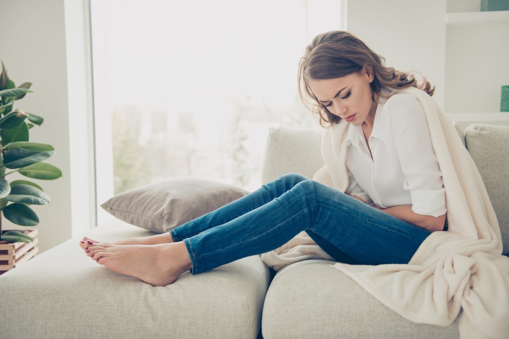 What is Functional Medicine? 10 Benefits of Functional Medicine for Your Health Goals | functional medicine unhappy woman holding hands on stomach suffering from abdominal pain with close eyes functional medicine - unhappy woman holding hands on stomach suffering from abdominal pain with close eyes