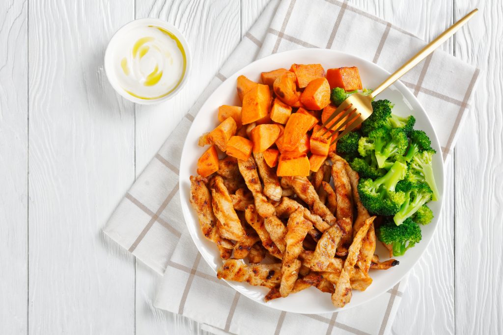 Nourishing Your Gut: A Guide to Delicious Gut-Loving Meals on the Go | gut loving meals Chicken and veggies platter sweet potato roasted chicken and broccoli gut-loving meals - Chicken and veggies platter, sweet potato, roasted chicken and broccoli