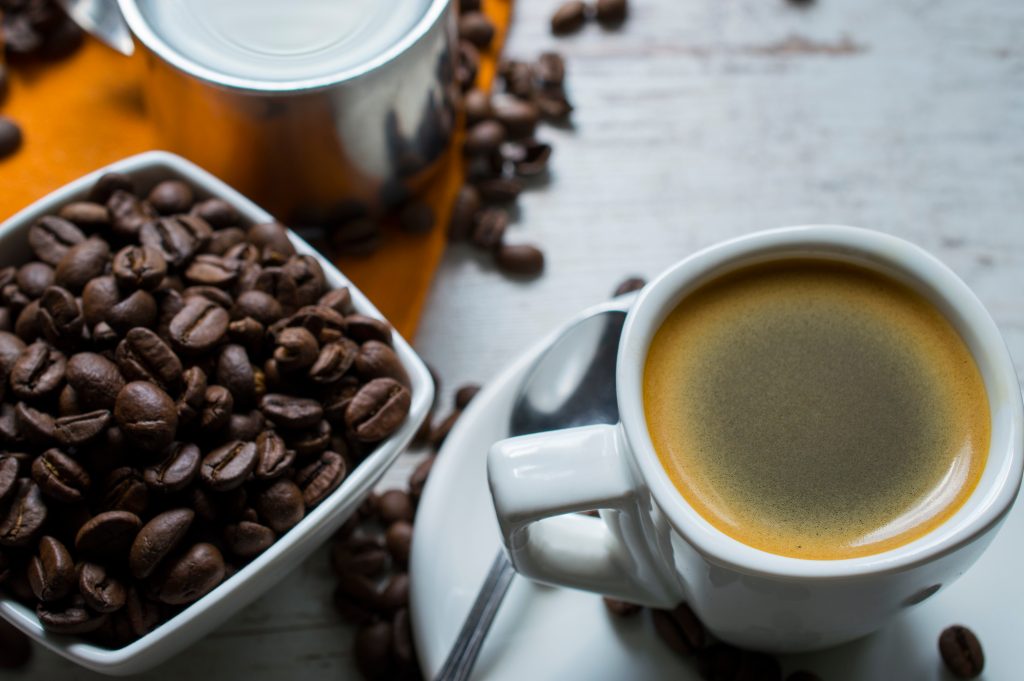 Have You Accidentally Eaten Foods That Cross-React with Gluten? Avoid These Top 10 Triggers | foods that cross react with gluten Espresso with milk. Still life in side light with retro analogue filter with vintage. Coffee beans on the table foods that cross-react with gluten - Espresso with milk. Still life in side light with retro analogue filter with vintage. Coffee beans on the table