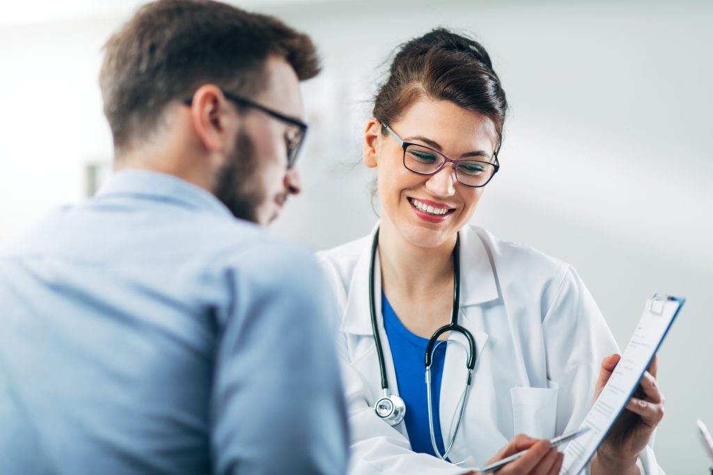 Alternative Treatments for Cancer: 6 Strategies to Heal Cancer Naturally with Functional Medicine | Alternative Treatments for Cancer Doctor and patient sitting in doctors office Alternative Treatments for Cancer - Doctor and patient sitting in doctor's office