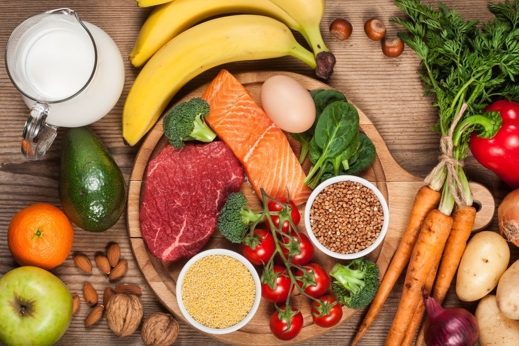 Eat for Your Gut Type: 8 Strategies to Boost Digestion Naturally | Strategies to Boost Digestion Balanced diet healthy food on wooden table Strategies to Boost Digestion - Balanced diet - healthy food on wooden table