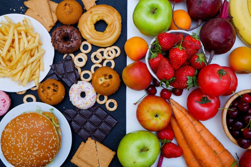 Eat for Your Gut Type: 8 Strategies to Boost Digestion Naturally | Strategies to Boost Digestion healthy versus unhealthy food fruits vegetables donuts sweets burgers Strategies to Boost Digestion - healthy versus unhealthy food, fruits, vegetables, donuts, sweets, burgers