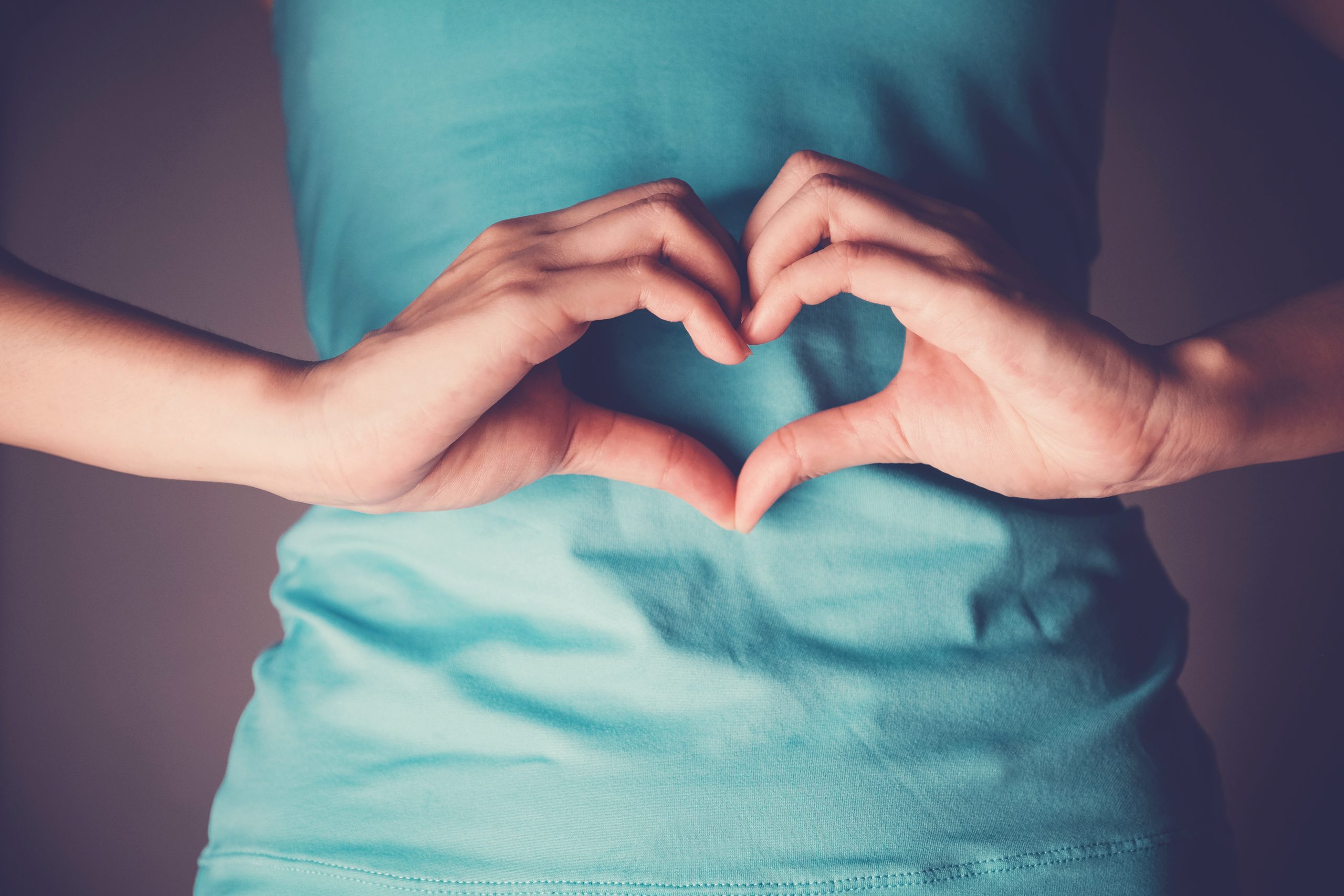 The Ultimate Guide to Gut Health + 3 Essentials to Heal Your Gut | gut health gut health Woman hands making a heart shape on her stomach scaled gut health gut health Woman hands making a heart shape on her stomach scaled | The Ultimate Guide to Gut Health + 3 Essentials to Heal Your Gut