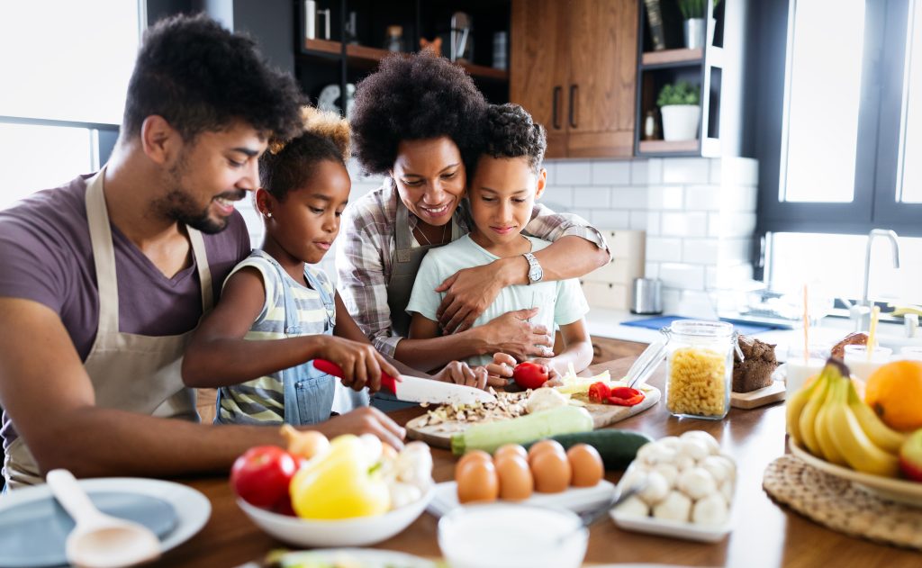 3 Easy Hacks to End Picky Eating And How to Help Your Kids to Eat Healthier | picky eating Happy family in the kitchen having fun and cooking together picky eating - Happy family in the kitchen having fun and cooking together