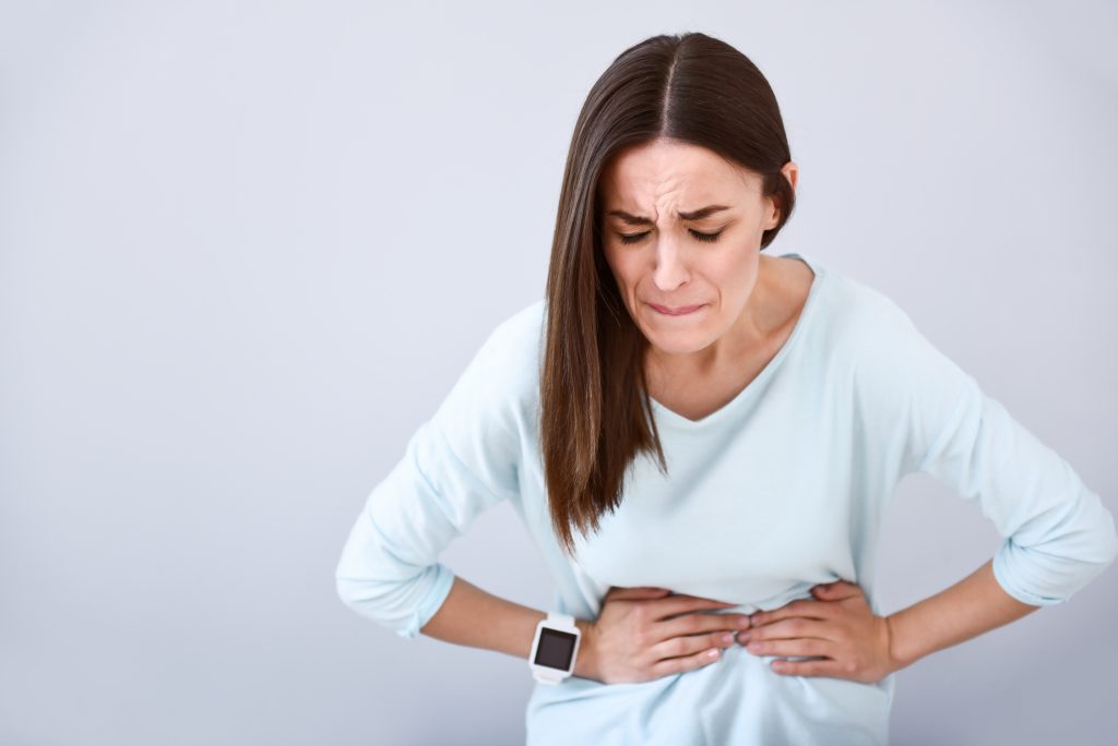Healing UTIs and Bladder Infections Naturally: 4 German New Medicine & Functional Medicine Remedies | bladder infections Sick woman having a stomach ache bladder infections - Sick woman having a stomach ache