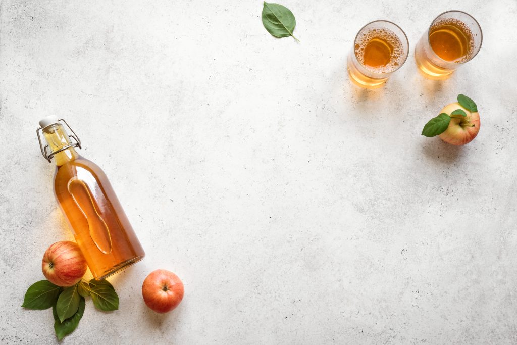 Natural Gallbladder Cleanse: Cholagogue Foods And 13 Total Lifestyle Strategies for Improving Gallbladder Health | natural gallbladder cleanse Apple cider drink or fermented fruit drink and organic apple natural gallbladder cleanse - Apple cider drink or fermented fruit drink and organic apple