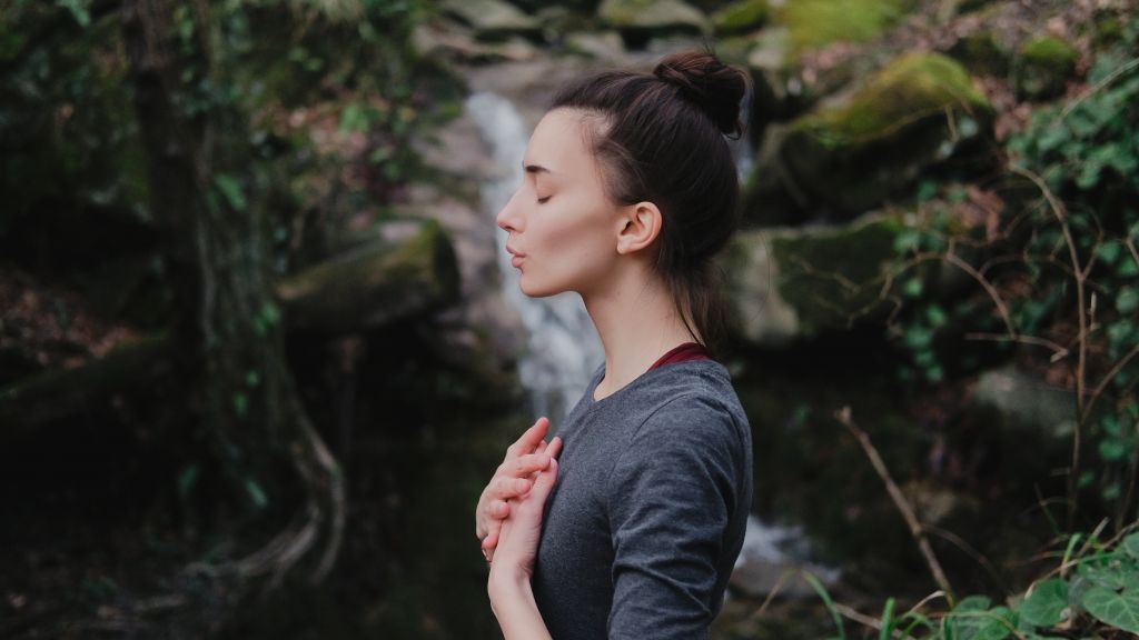How to Cure SIBO Naturally: The #1 Strategy No One is Talking About | How to cure SIBO a young lady looking breathing exercise relaxing How to cure SIBO - a young lady looking breathing exercise - relaxing